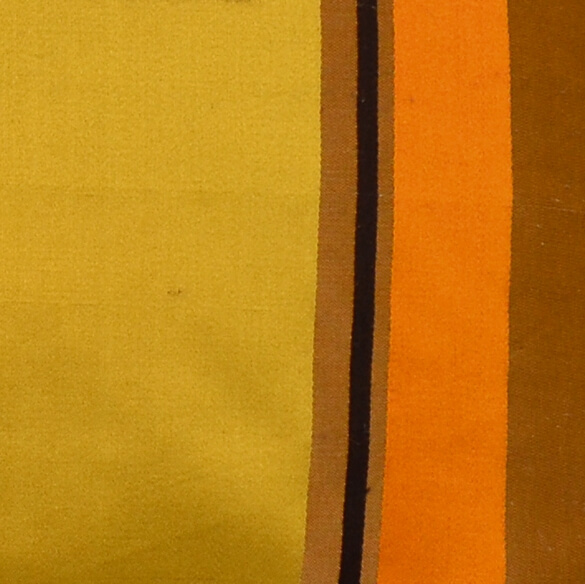 Hier sehen Sie ein farbenfrohes Kissen-Unikat in verschiedenen, starken Farben und unterschiedlichen Stoffen von AN-NA Design, einer kleinen Kissen-Manufaktur im Bergischen Land.