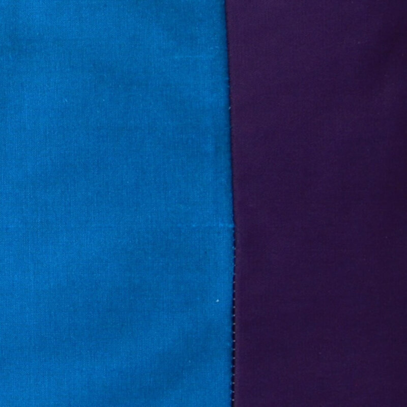 Hier sehen Sie ein farbenfrohes Kissen-Unikat in verschiedenen, starken Farben und unterschiedlichen Stoffen von AN-NA Design, einer kleinen Kissen-Manufaktur im Bergischen Land.