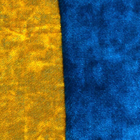 Ein farbenfrohes Kissen-Unikat von AN-NA Design in den Farben Blau, Türkis und Gelb.