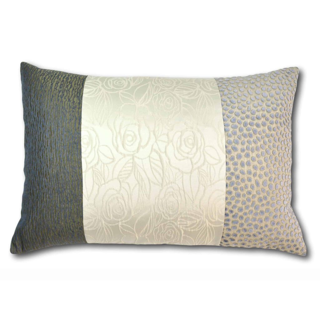 Bei AN-NA Design finden Sie hochwertige Kissen und besondere Geschenke. AN-NA Design ist eine Design Manufaktur. Unsere Kissen werden in Deutschland handgefertigt. Hier ein Kissen in den Farben Wollweiß, Beige, Grau, Hellblau und Dunkelblau.