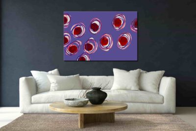 Farbenfrohes Wanddesign von Anna von der Heiden bei AN-NA Design. Hochwertiger Druck auf Leinwand. Serie Bubbles in verschiedenen Rottönen, mit lilafarbener Umrandung.